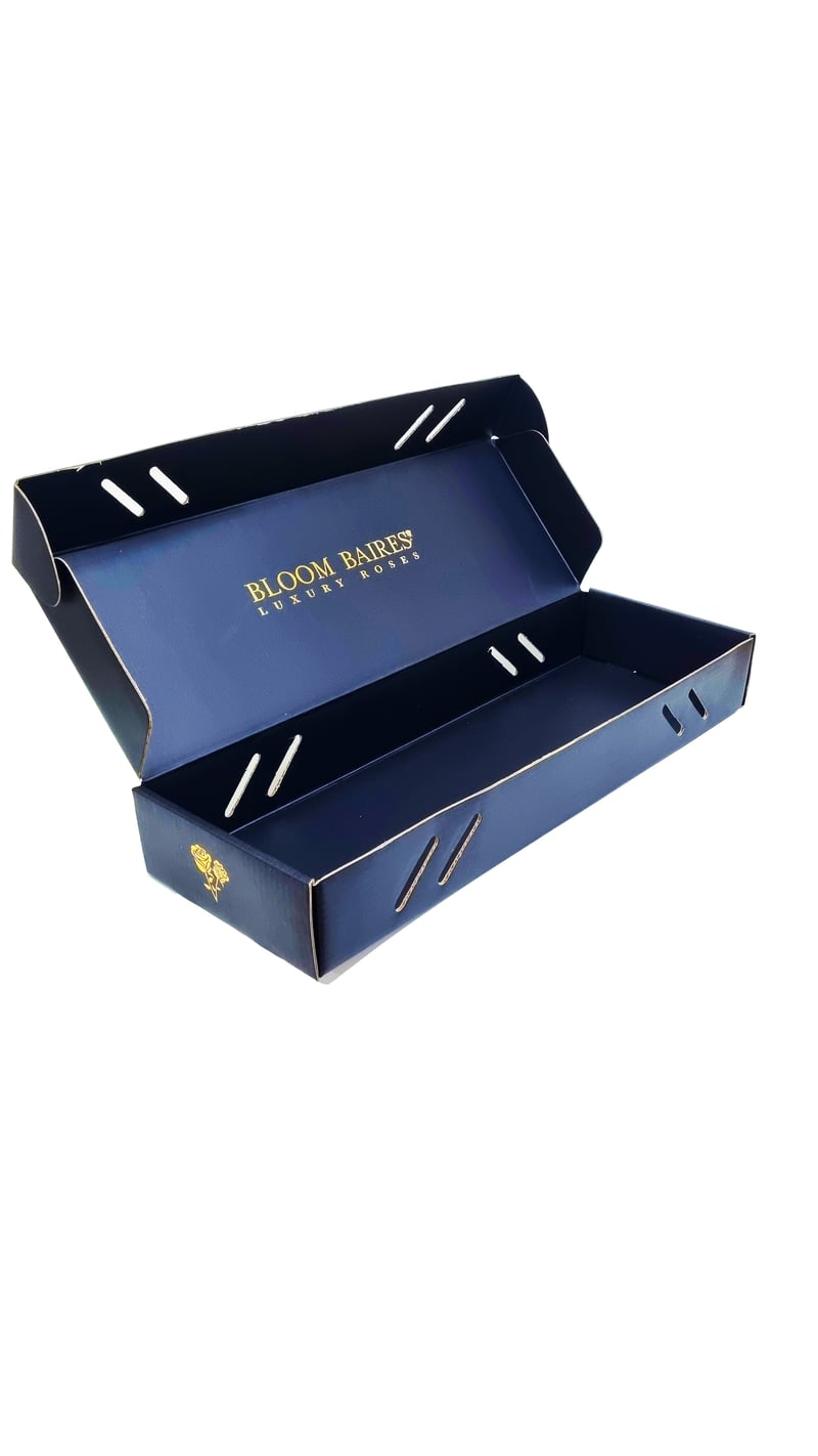 Estuche premium abierto con interior personalizado Bloom Baires.